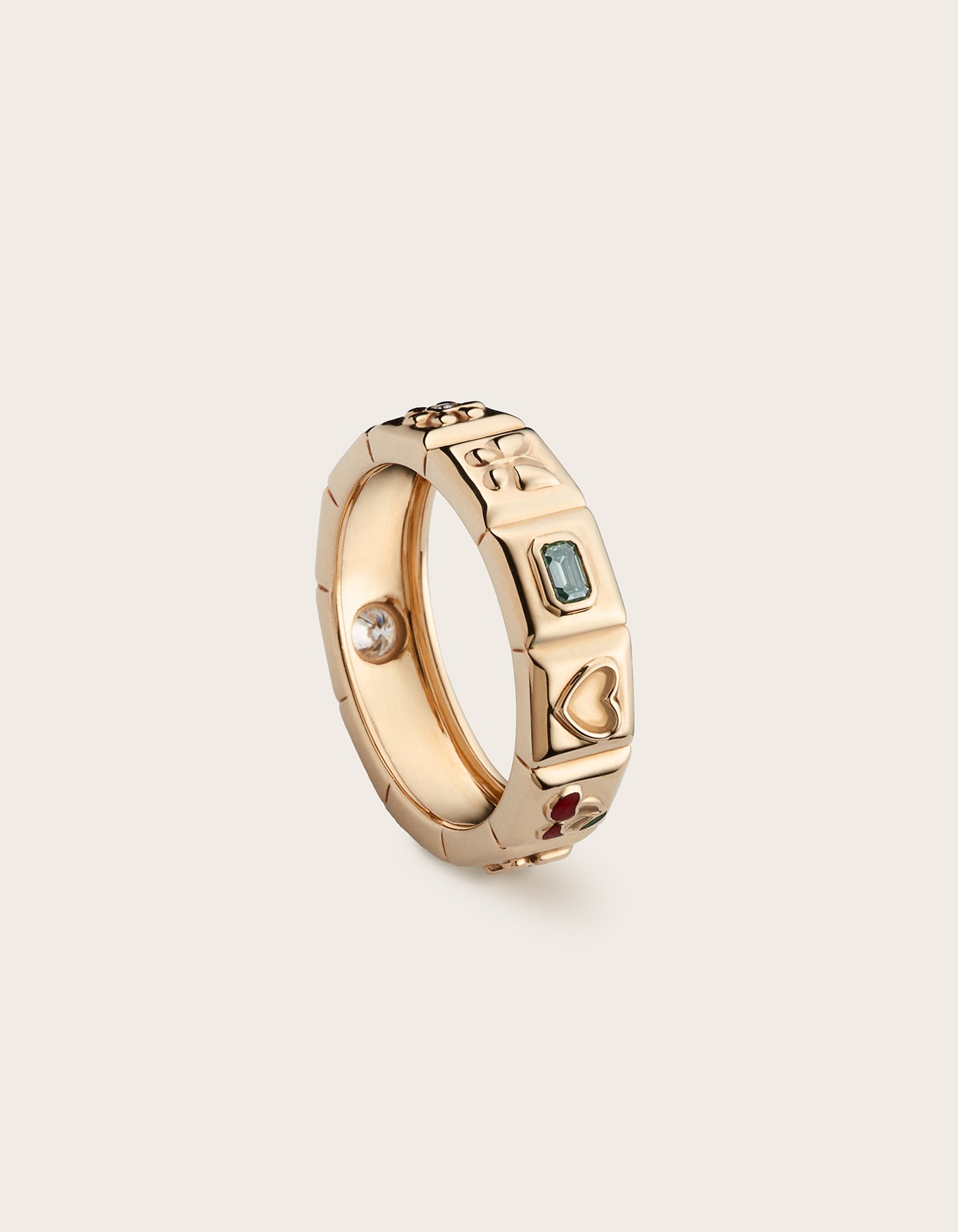 Side view of 14K yellow gold Chiara Charm Ring with lab-grown diamonds, with a focus on the green stone