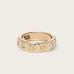 Front view of 14k yellow gold Chiara Charm Ring with lab-grown diamonds, with a focus on the smiley charm