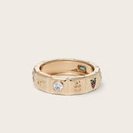 Front view of 14K yellow gold Chiara Charm Ring with lab-grown diamonds, with a focus on the diamond charm