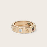 Front view of 14K yellow gold Chiara Charm Ring with lab-grown diamonds, with a focus on the diamond charm