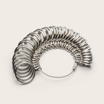 Metal ring sizer on a white background.